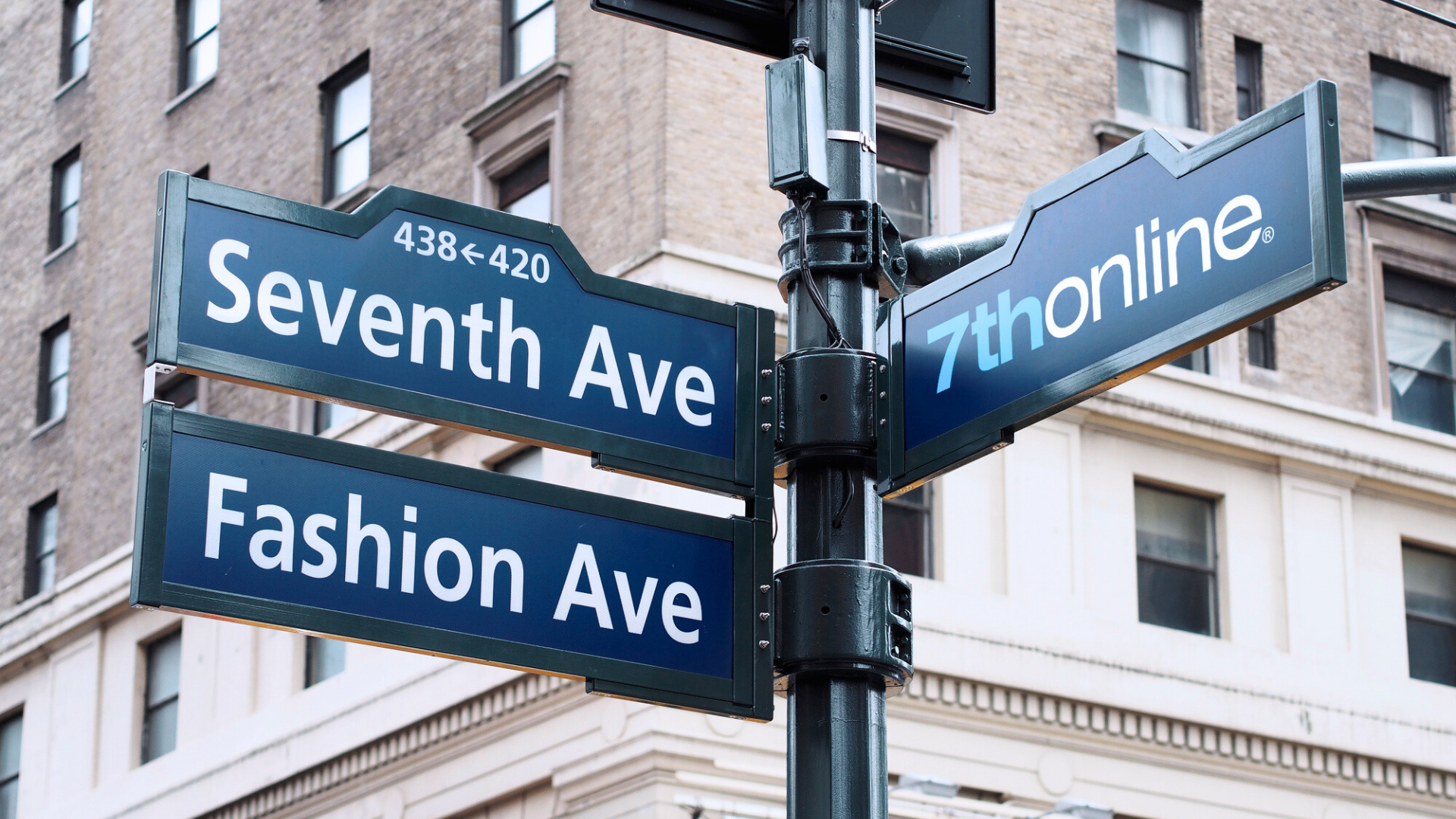 cross street signs for 7th avenue, known as fashion avenue, and 7thonline